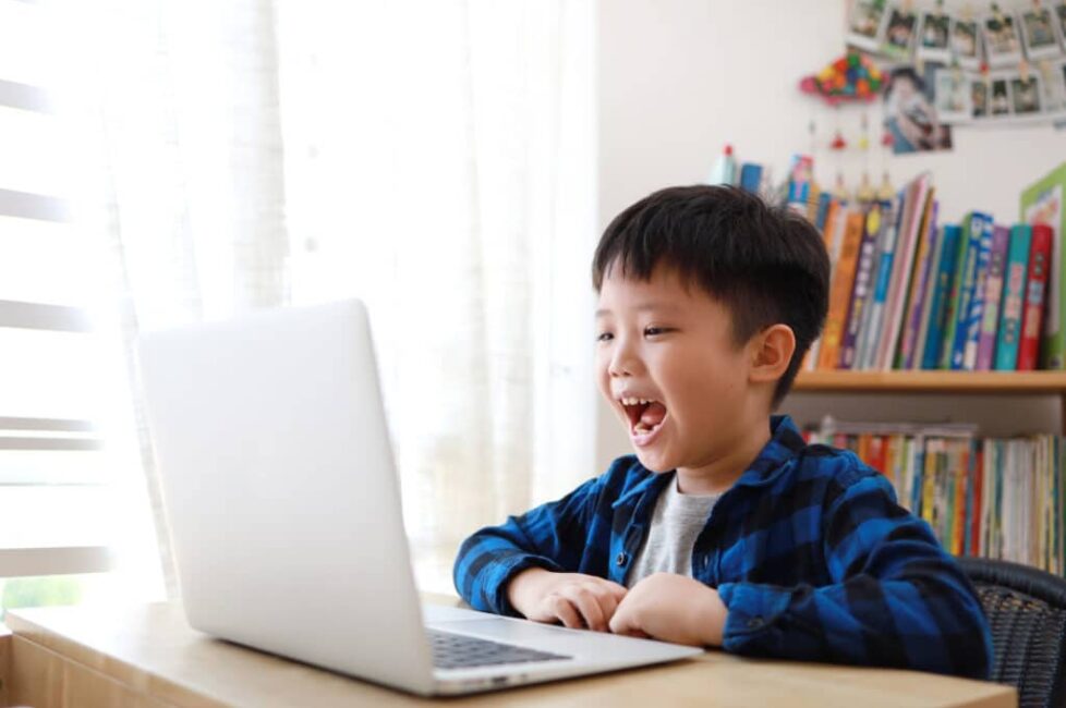 A child receiving speech therapy to help speech sound challenges in kids.
