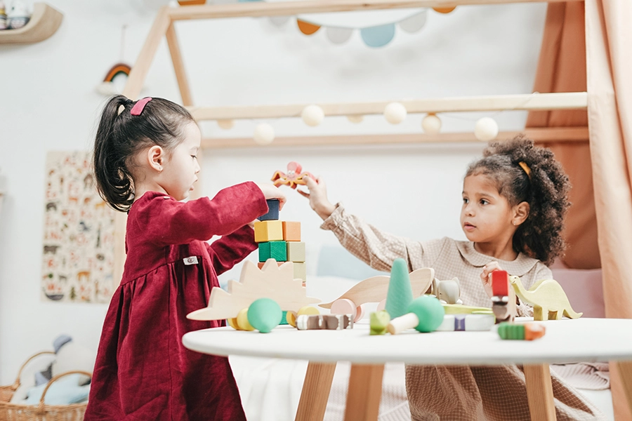 Two children participating in social communication therapy.