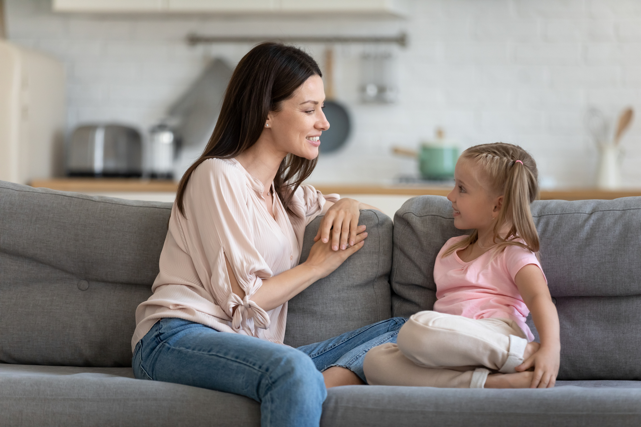 A mother talking with her daughter with her speech.