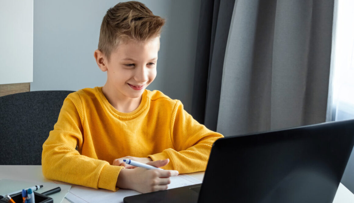 A child participating in r speech therapy online.