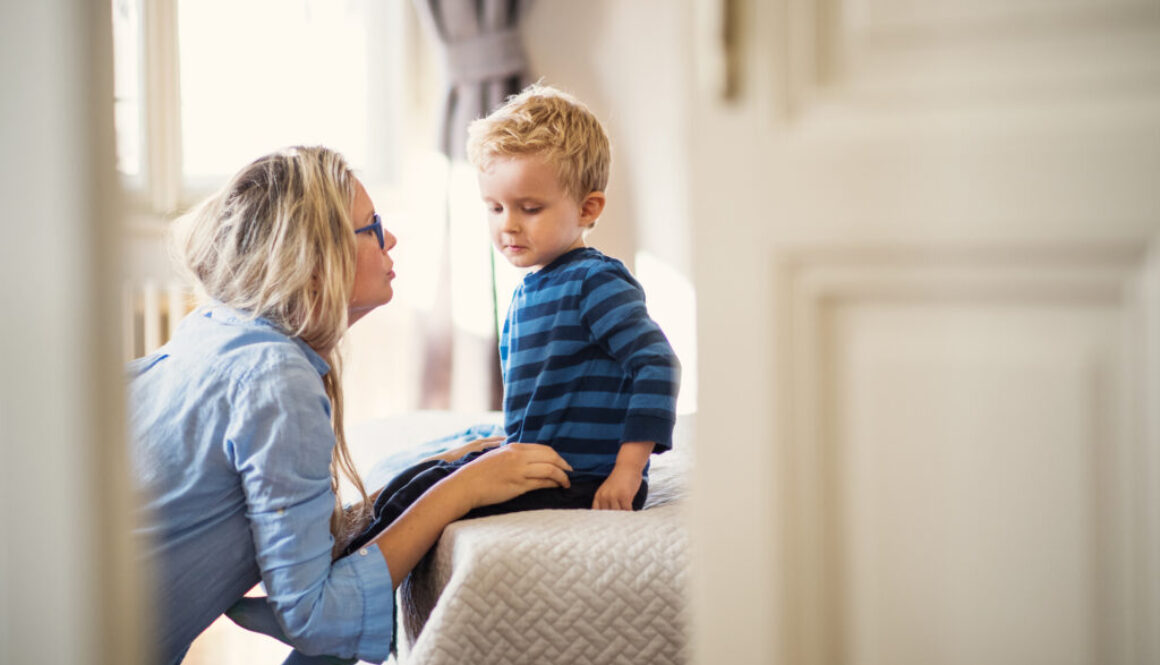 A mother talking to her child who is stuttering.