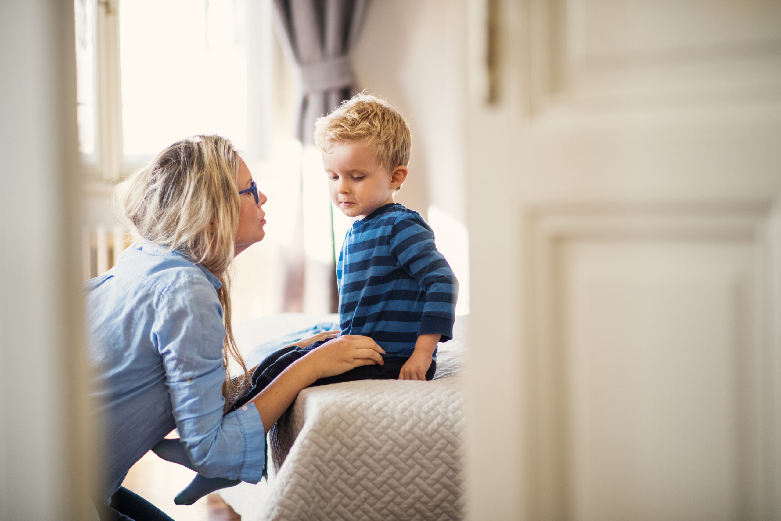 A mother talking to her child who is stuttering.
