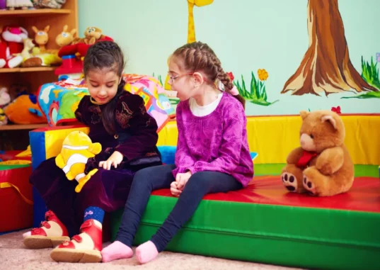 Children with autism talking to each other.