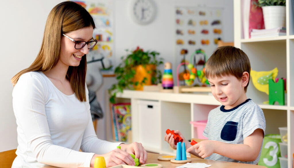 Speech therapy for autism at a therapy clinic.