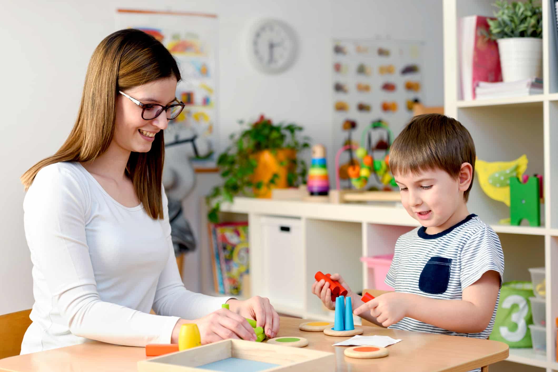 Speech therapy for autism at a therapy clinic.