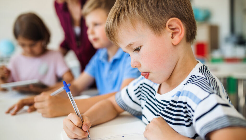 Children learning better language skills in school.