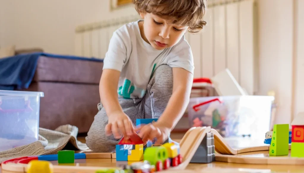 A child participating in play-based speech therapy at home